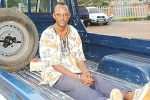 Deo Mushayidi at the back of a Police Pick-up