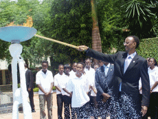 Paul Kagame lights the flame at the Kigali Genocide Memorial Center