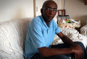 Rene Mugenzi, at home in south London: afraid for his life 